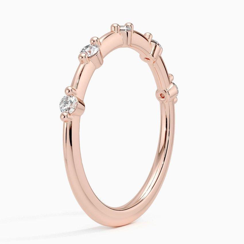 Vigselring i roséguld med diamanter