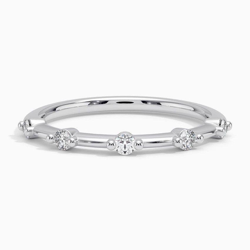 Vigselring i vitguld med diamanter