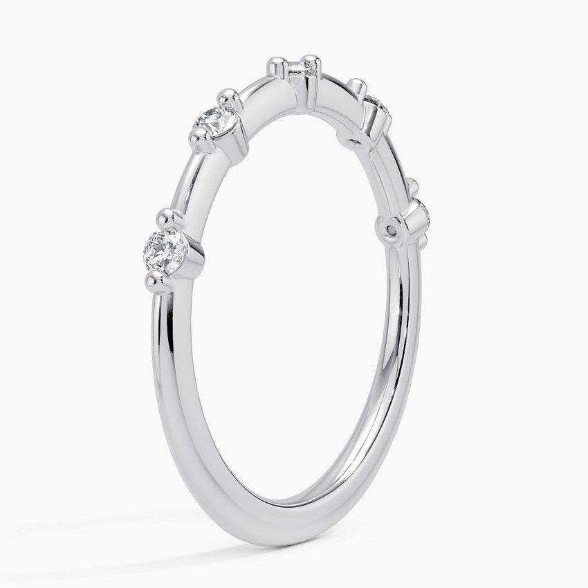 Vigselring i vitguld med diamanter
