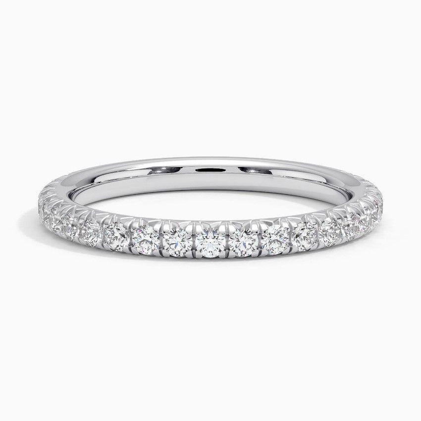 Vigselring i vitguld med diamanter