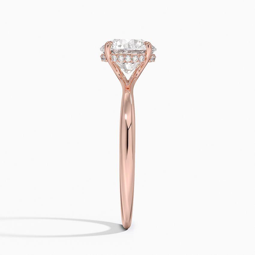 Förlovningsring i roséguld med dolt halo