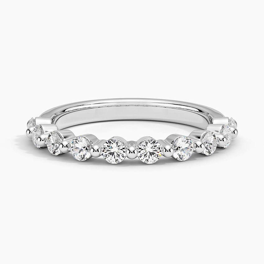 Vigselring i vitguld med diamanter