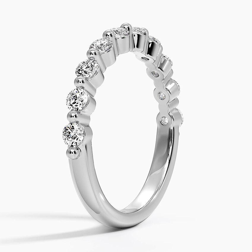Vigselring i vitguld med diamanter